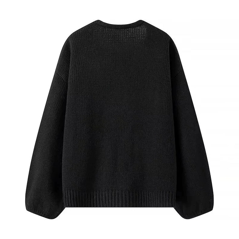 Elegancia a la luz de la luna – Cárdigan con lazos de lentejuelas