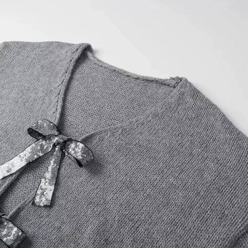 Elegancia a la luz de la luna – Cárdigan con lazos de lentejuelas