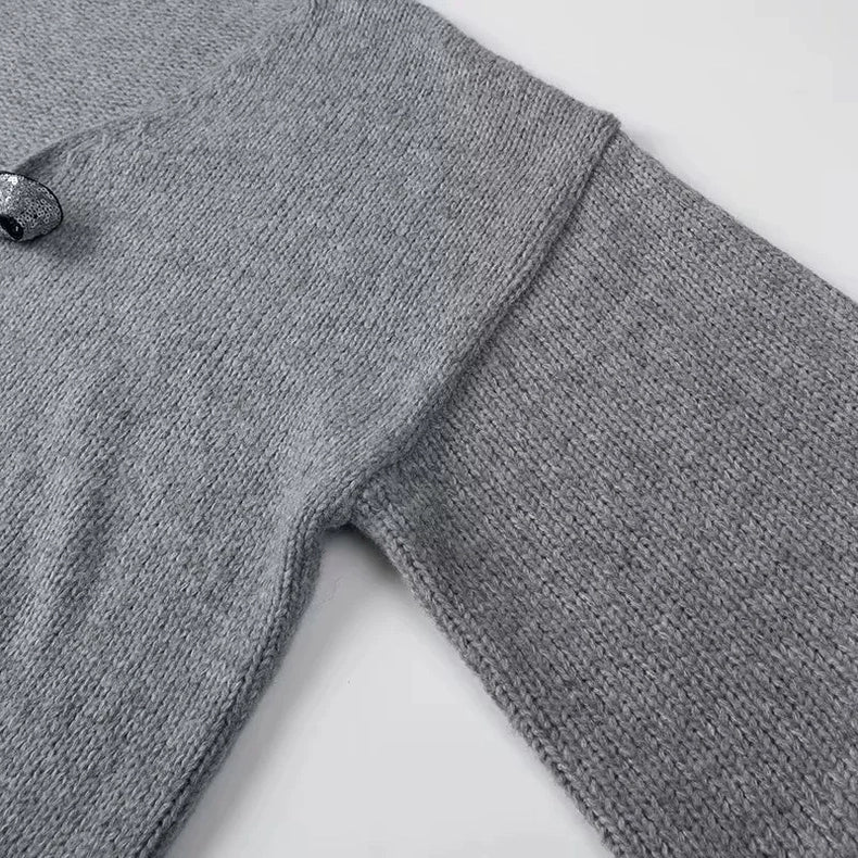 Elegancia a la luz de la luna – Cárdigan con lazos de lentejuelas