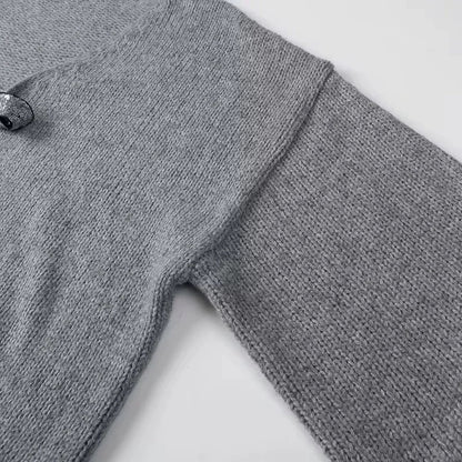 Elegancia a la luz de la luna – Cárdigan con lazos de lentejuelas