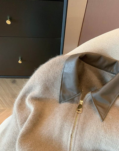 Cárdigan elegante con detalles de piel sintética.